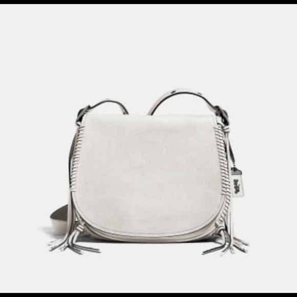 coach fringe saddle bag